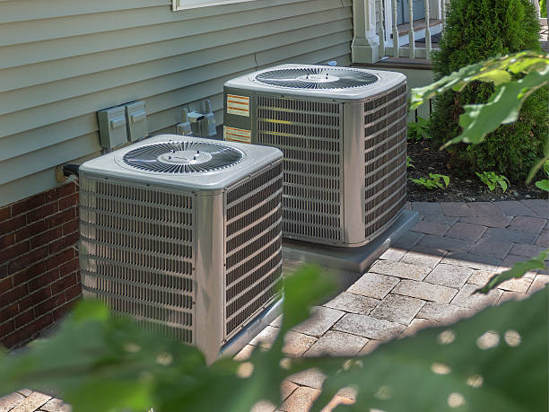 Happy customer with a Dallas Heating and Air Conditioning technician