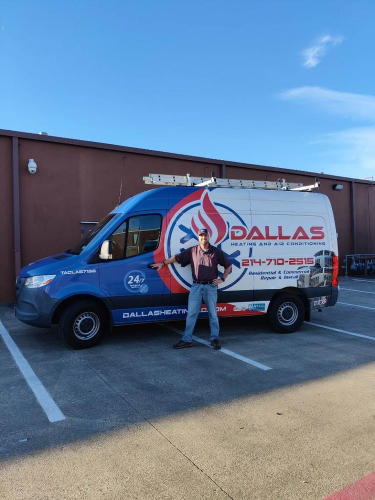 Dallas Heating and Air Conditioning technician on a roof