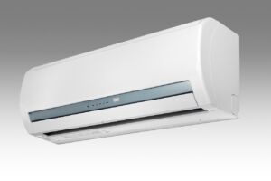 Mini-split ductless air conditioning unit installed on interior wall